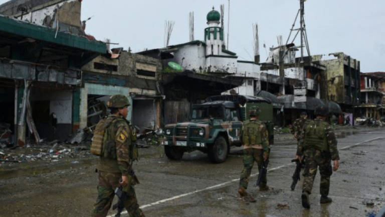 Life begins returning to war-torn Philippine city