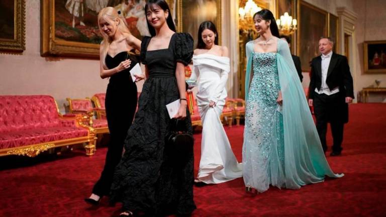 The global pop icons looking like royalties as they attend the South Korea-UK state banquet held at Buckingham Palace. – TWITTER/@ABOUTMUSICYT