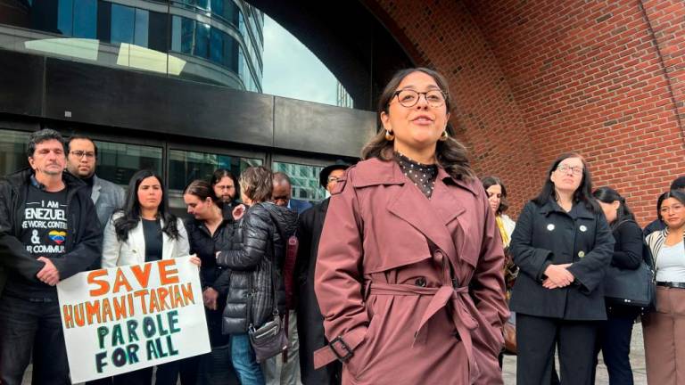 Laura Flores-Perilla, a lawyer with the immigrant rights group Justice Action Center, speaks with reporters about a lawsuit challenging U.S. President Donald Trump's administration's plans to end humanitarian parole programs for migrants, outside the federal courthouse in Boston, Massachusetts, U.S., April 10, 2025. -REUTERSPIX