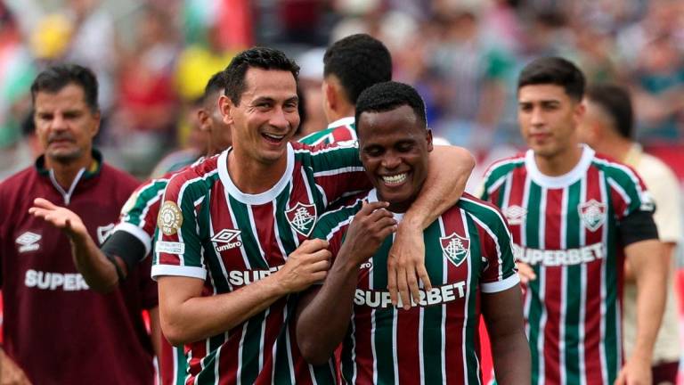 Fluminense’s Ganso and Jhon Arias celebrate after the match IMAGN IMAGES via REUTERS