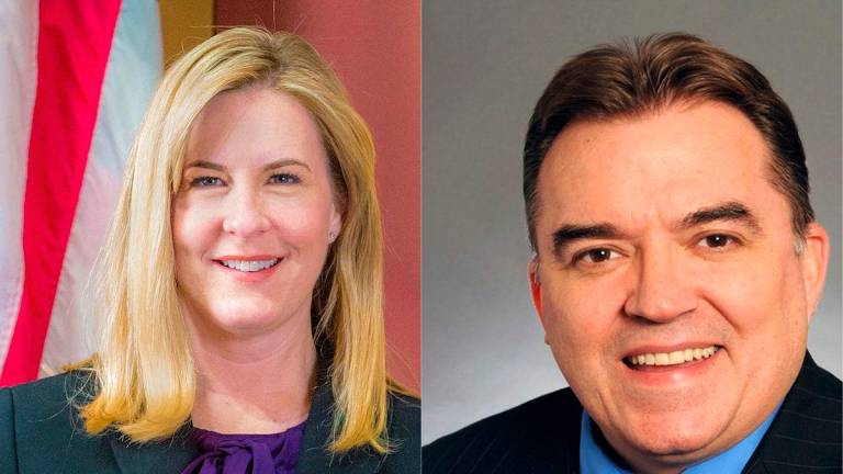 US police hunt gunman after state lawmaker killed, another hurt