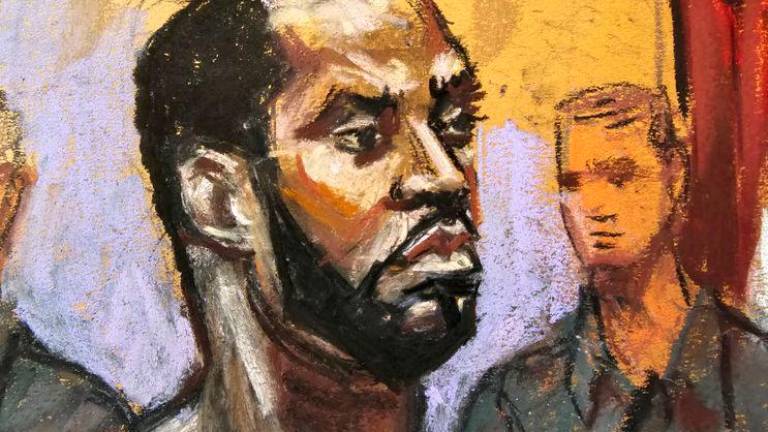 Sean Diddy Combs stands before U.S. Magistrate Judge Robyn Tarnofsky after prosecutors brought three criminal charges against him in federal court in the Manhattan borough of New York City, U.S., September 17, 2024 in this courtroom sketch. - REUTERSPIX