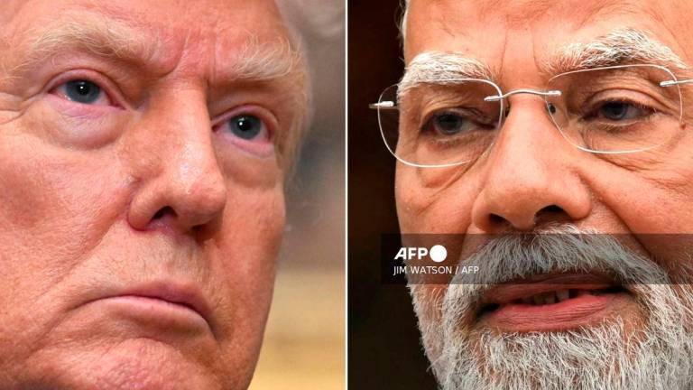 This combination of pictures shows US President Donald Trump (L) in Washington, DC, on July 30, 2025 and India's Prime Minister Narendra Modi in New Delhi on July 21, 2025. - AFP