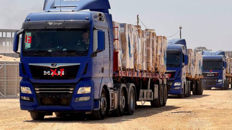 Trucks transport aid as Gaza Humanitarian Foundation said it has commenced operations to begin distribution of aid, in Rafah, in the southern Gaza Strip, May 26, 2025. REUTERSpix