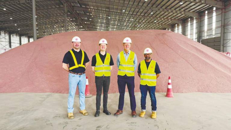 From left: GMA Garnet Group Apac supply chain manager Arno Taljaard, Cowan, Jebsen &amp; Jessen Group chairman Heinrich Jessen and Shashi at the company’s Port Klang distribution facility.
