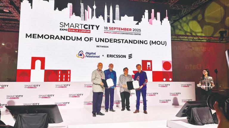 From left: Azman, Digital Minister Gobind Singh Deo, Digital Ministry secretary-general Fabian Bigar and Hägerbro at the launch of the programme.