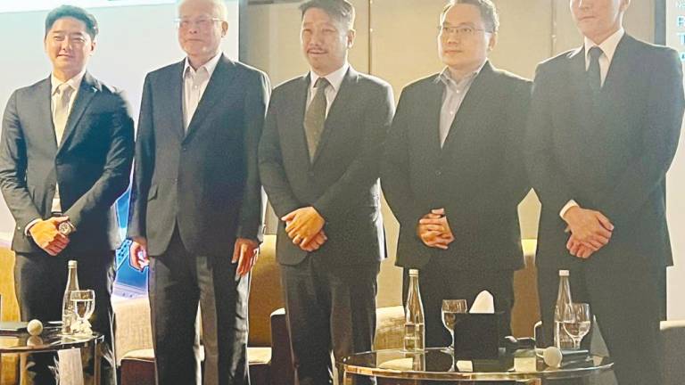 From left: Nomura Asset Management Malaysia investment product specialist Tan Yong Xin, Wong, Yap, Pacific University of Technology and Innovation senior head of school Dr Thang Ka Fei and Kawamoto at the press conference.
