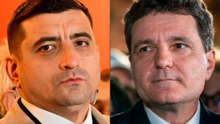 This combination created on May 5, 2025 of file pictures shows Romanian Presidential candidates, the leader of the far-right Alliance for the Union of Romanians (AUR) George Simion (L, as he addressed supporters in Bucharest on December 1, 2024), and pro-European Bucharest mayor and founder of the liberal Save Romania Union (USR) party Nicusor Dan (R).