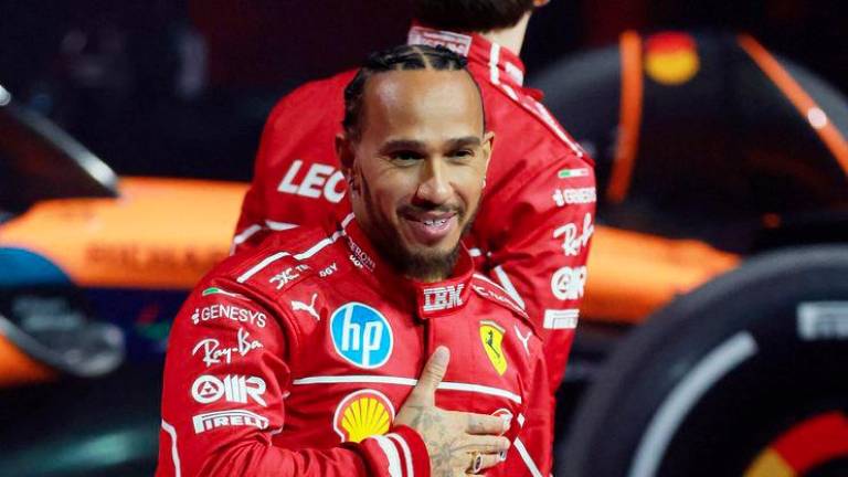 Formula One F1 - F1 75 Live Season Launch - The O2, London, Britain - February 18, 2025 Ferrari's Lewis Hamilton during the launch - REUTERSPIX