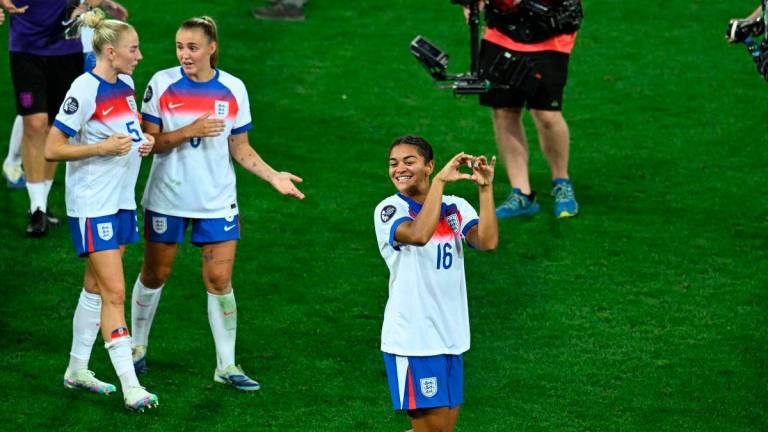 England’s Jessica Carter gestures to their fans after the match REUTERS