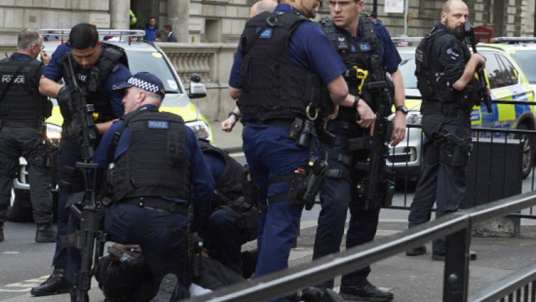Police arrest 'terror act' knifeman by British parliament