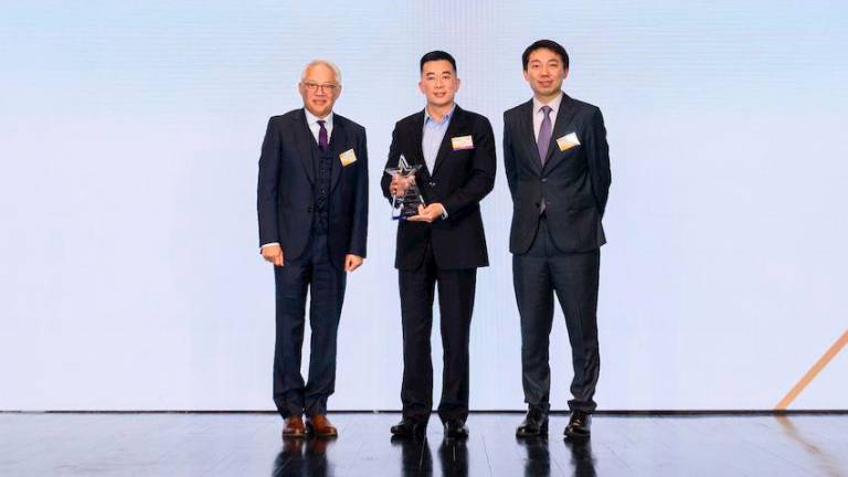 Mr. Paul Ng (middle), the Executive Director and Head of International Operations of ZJLD Group