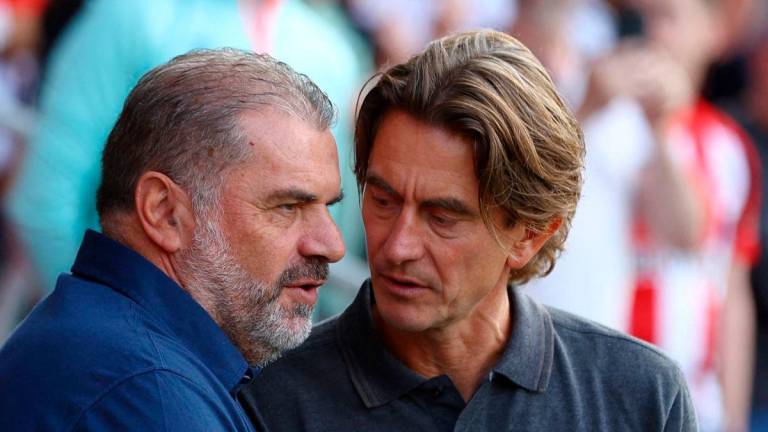 FILEpix: Tottenham Hotspur manager Ange Postecoglou shakes hands with the new manager Thomas Frank in a taken on Aug 13, 2023.