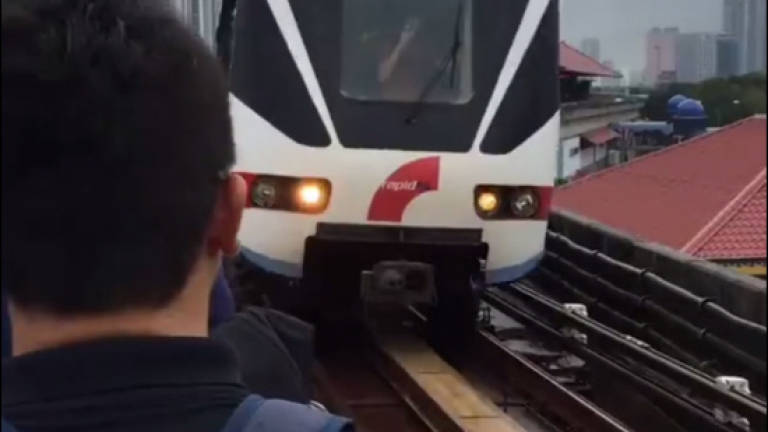 LRT commuters forced to trek to next station after glitch