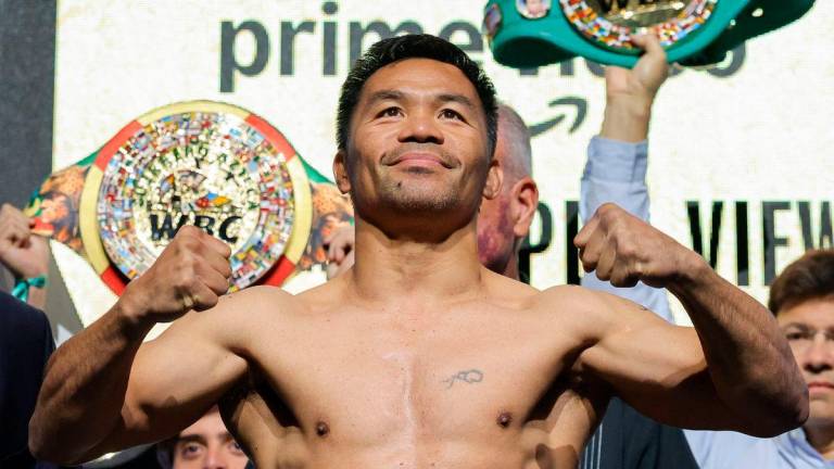 Manny Pacquiao poses during a ceremonial weigh-in at MGM Grand Garden Arena on July 18, 2025 in Las Vegas, Nevada. Pacquiao, who announced he was coming out of retirement nearly four years after his last fight, is scheduled to challenge WBC welterweight champion Mario Barrios for his title on July 19 at MGM Grand Garden Arena. Photo by Ethan Miller / GETTY IMAGES NORTH AMERICA / AFP
