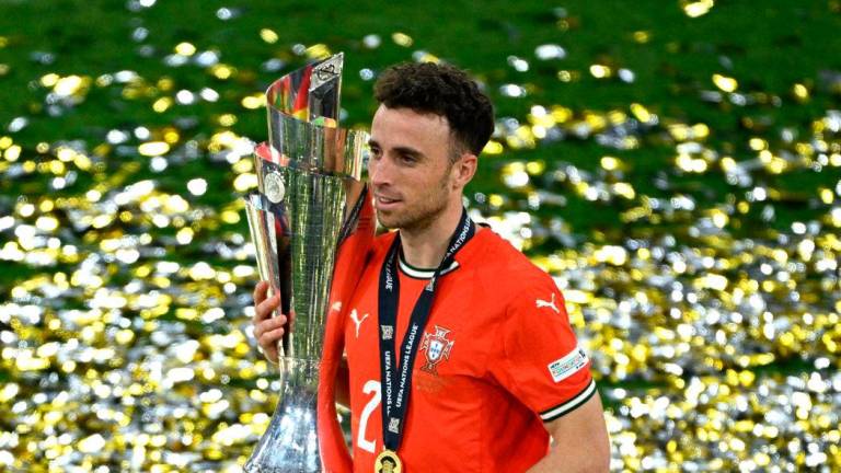 FILE PHOTO: Soccer Football - Nations League - Final - Portugal v Spain - Allianz Arena, Munich, Germany - June 9, 2025 Portugal’s Diogo Jota celebrates with the trophy after winning the Nations League REUTERS/Annegret Hilse/File Photo