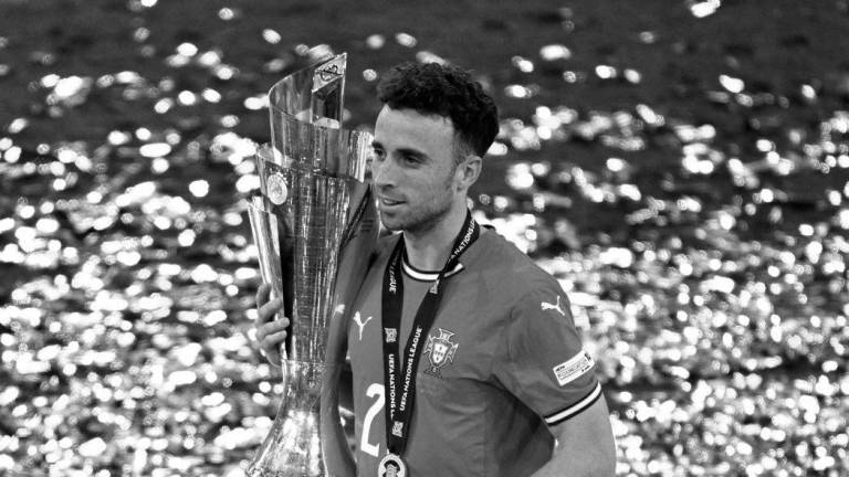 FILE PHOTO: Soccer Football - Nations League - Final - Portugal v Spain - Allianz Arena, Munich, Germany - June 9, 2025 Portugal’s Diogo Jota celebrates with the trophy after winning the Nations League REUTERS/Annegret Hilse/File Photo