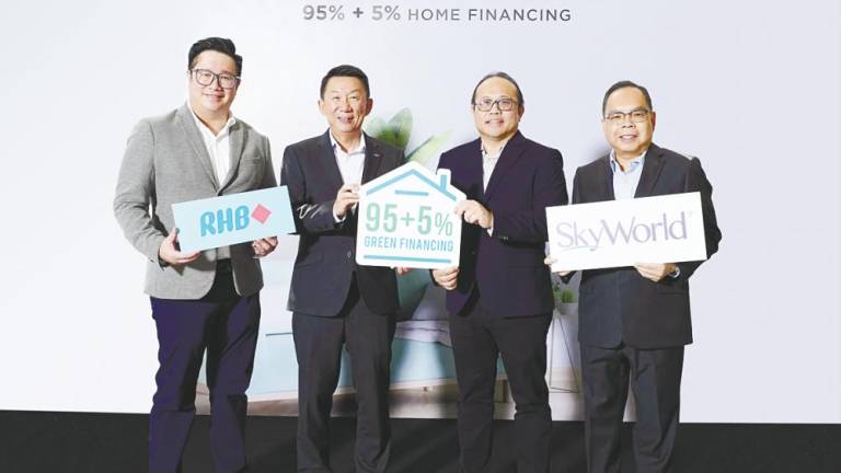 From left: RHB Banking Group consumer finance, group community banking head Sien Vee Loc, group community banking managing director Jeffrey Ng Eow Oo, Lee, and SkyWorld Development Bhd founder and executive chairman Datuk Seri Ng Thien Phing.