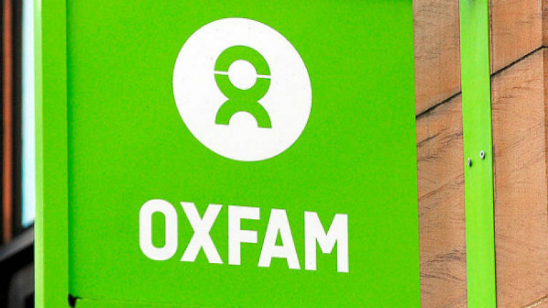 Oxfam staff bullied witness in prostitution case: inquiry