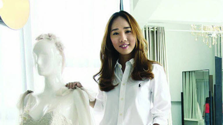 Here comes the bridal designer