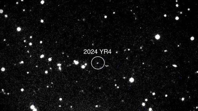 This handout picture provided by NASA on January 31, 2025 shows asteroid 2024 YR4 as observed by the Magdalena Ridge 2.4m telescope at the New Mexico Institute of Technology on January 27, 2025. - AFPPIX