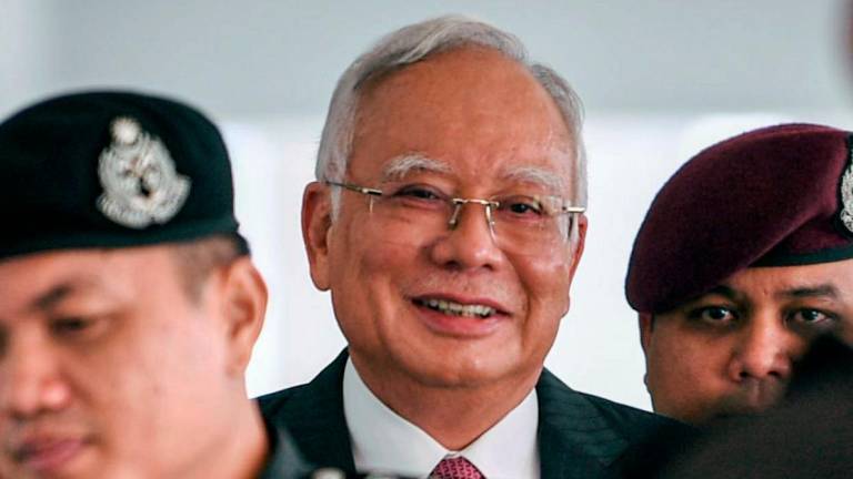 Bekas Perdana Menteri Datuk Seri Najib Tun Razak ketika hadir bagi prosiding sambung bicara kes penyelewengan dana 1Malaysia Development Berhad (1MDB) yang dihadapinya di Mahkamah Tinggi pada Feb 19.
