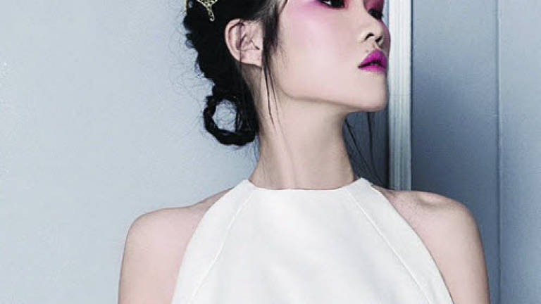 Here comes the bridal designer