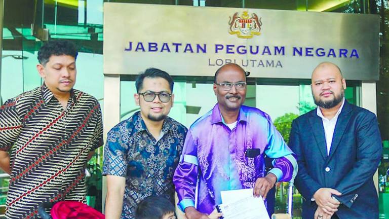 Isaiah (third from left) at the Attorney-General’s Chambers after submitting a memorandum. – Adam Amir Hamzah/theSun
