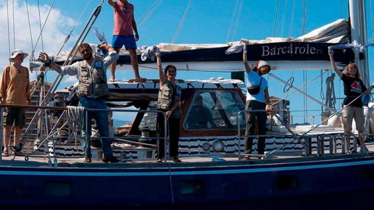 FILE PHOTO: Activist Greta Thunberg and crew stand aboard the aid ship Madleen, which left the Italian port of Catania on June 1 to travel to Gaza to deliver humanitarian aid, in this picture released on June 2, 2025 on social media. Freedom Flotilla Coalition/via REUTERS