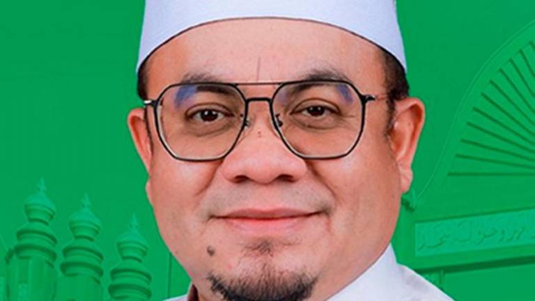 Pengerusi Jawatankuasa Kerajaan Tempatan, Perumahan, Kesihatan dan Alam Sekitar Kelantan Hilmi Abdullah - fotoBERNAMA