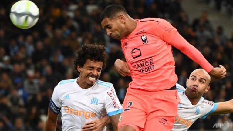 Marseille tune out Evra drama, Lyon win heated derby