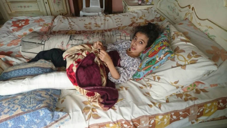 Syrian girl shot by sniper evacuated to hospital