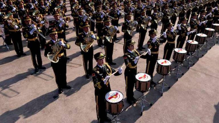 A military orchestra plays during training ahead of a military parade to mark the 80th anniversary of the end of World War Two, in Beijing, China, August 20, 2025. - REUTERSPIX
