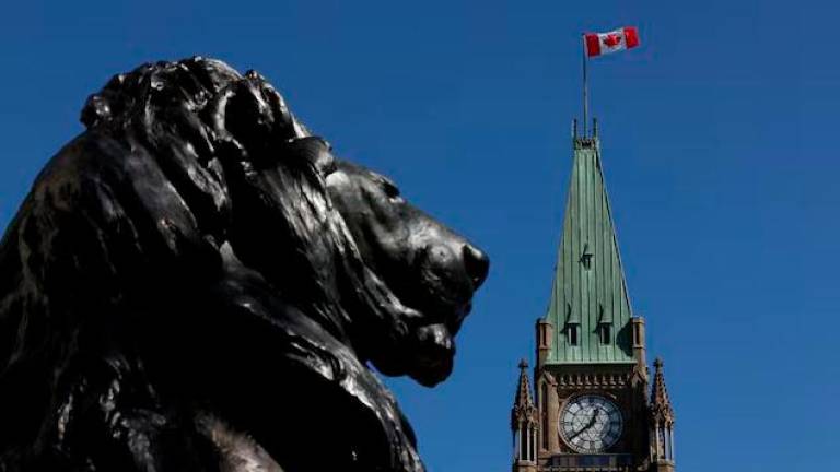 General view of the Peace Tower over Centre Block on Parliament Hill in Ottawa, Ontario, Canada September 17, 2020. - REUTERSPIX
