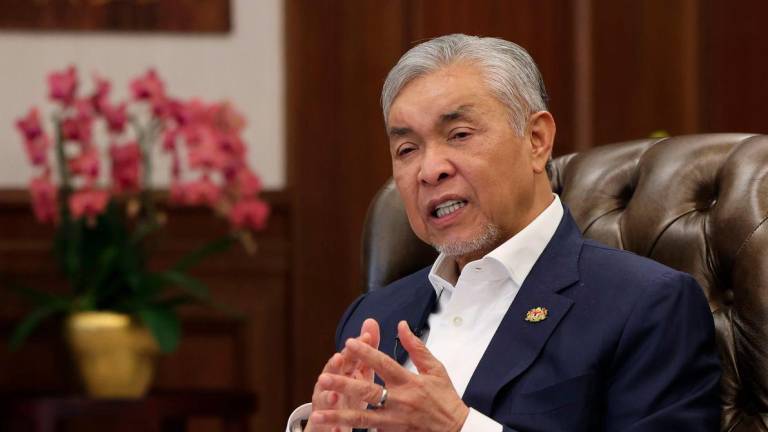 Timbalan Perdana Menteri Datuk Seri Dr Ahmad Zahid Hamidi ketika temu bual khas bersama Bernama di pejabatnya Bangunan Perdana Putra hari ini. - fotoBERNAMA