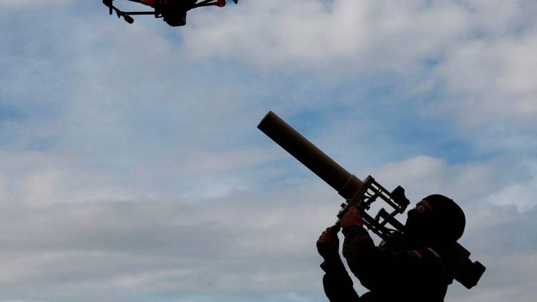 A soldier of the German armed forces demonstrates a HP 47 drone jammer during the defence exercise Red Storm Bravo in which civilian and military coordination is trained and led by German army Bundeswehr in Hamburg, Germany, September 26, 2025. - REUTERSPIX