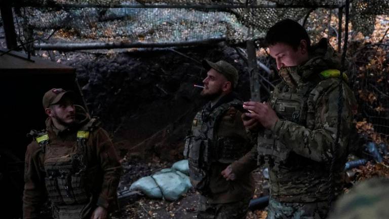 Artillerymen of the 15th 'Kara-Dag' Brigade of the Operational Assignment of the National Guard of Ukraine stand at a position, amid Russia's attack on Ukraine, near the frontline town of Kupiansk in Kharkiv region, Ukraine October 17, 2025. - REUTERSPIX