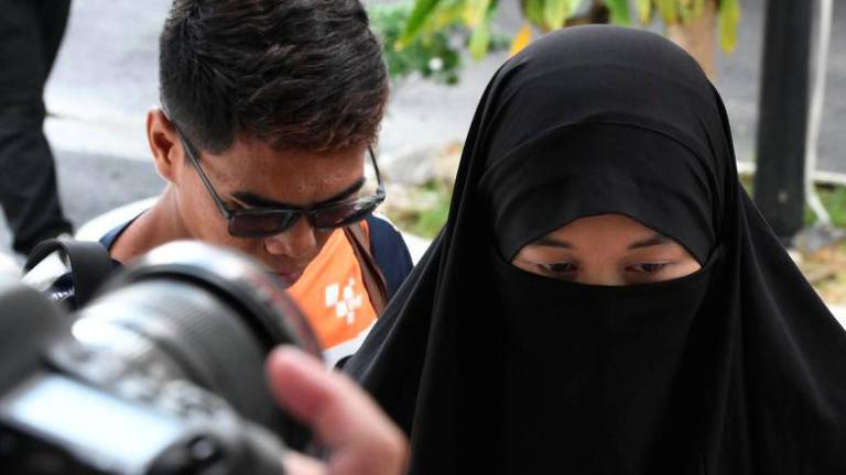 A single mother who was arrested by police for claiming she was forced into prostitution was fined RM4,000 by the Magistrate's Court here today for a making false statement.- fotoBERNAMA