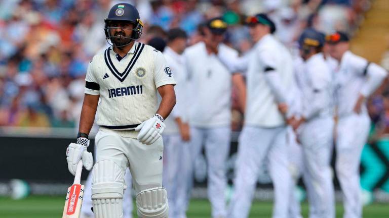 India’s Karun Nair walks back to the pavilion after losing his wicket for 31 runs on the opening day of the second cricket test match between England and India at Edgbaston cricket ground in Birmingham, central England on July 2, 2025. (Photo by Darren Staples / AFP)