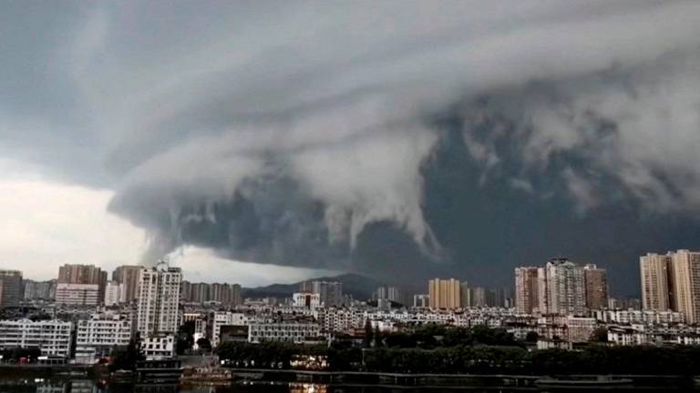 A view shows dark cloud approaching the city of Zhuhai as Typhoon Wipha makes landfall, Guangdong Province, China, July 20, 2025, in this screen grab obtained from a social media video. - SOCIAL MEDIA/via REUTERS - Location was verified by buildings, water body, urban layout and terrain which match satellite and file images. - Date was verified by Zhuhai government release on WeChat on Sunday (July 20).