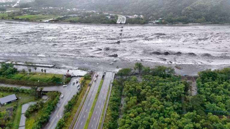 A drone view shows a collapsed bridge submerged in flood waters, in the aftermath of Super Typhoon Ragasa, in Guangfu township, Hualien County, Taiwan September 24, 2025 in this screengrab obtained from a video. The Warthog Air Squadron/via REUTERS