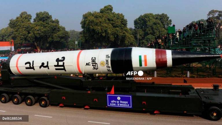 India's Agni 5 Missile is displayed during the final full dress rehearsal for the Indian Republic Day parade in New Delhi on January 23, 2013. - AFP