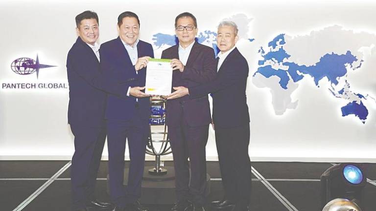 From left: Pantech Global group executive director Lim Soon Beng, Tan, non-executive, non-independent chairman Datuk Jimmy Chew and deputy group managing director Kong Chiong Lee unveiling the company’s prospectus at the launch.