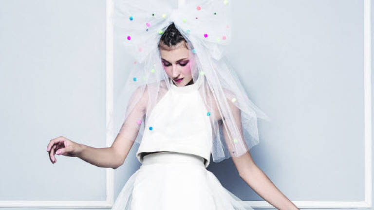 Here comes the bridal designer