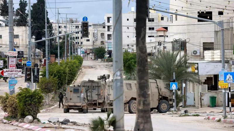 Israeli troops at the entrance to the occupied West Bank refugee camp of Tulkarem © Jaafar ASHTIYEH / AFP