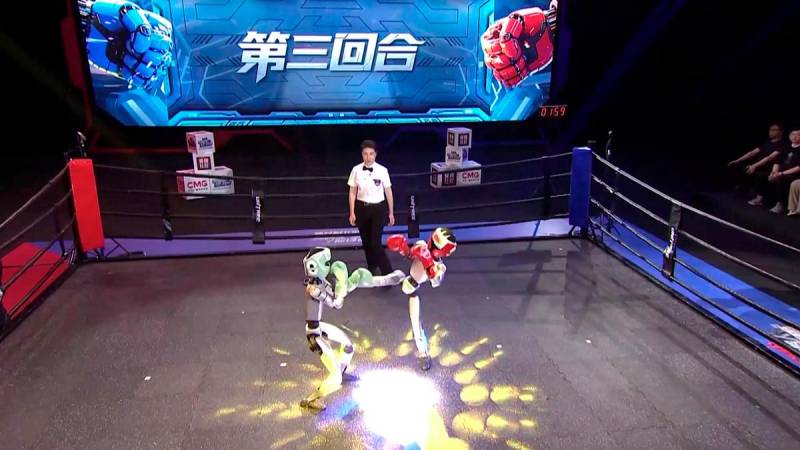 Two robots fight on stage during the world’s first humanoid robot fighting competition, Hangzhou City, east China’s Zhejiang Province, May 25, 2025. /China Media Group