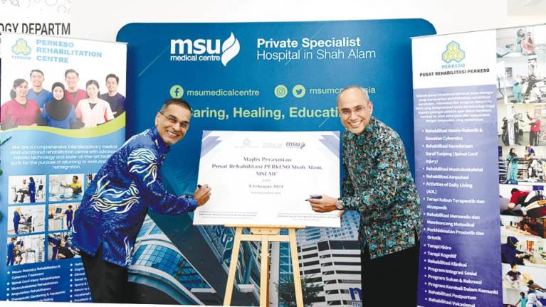 Mohammed Azman (left) and Mohd Shukri during the launch at MSUMC.