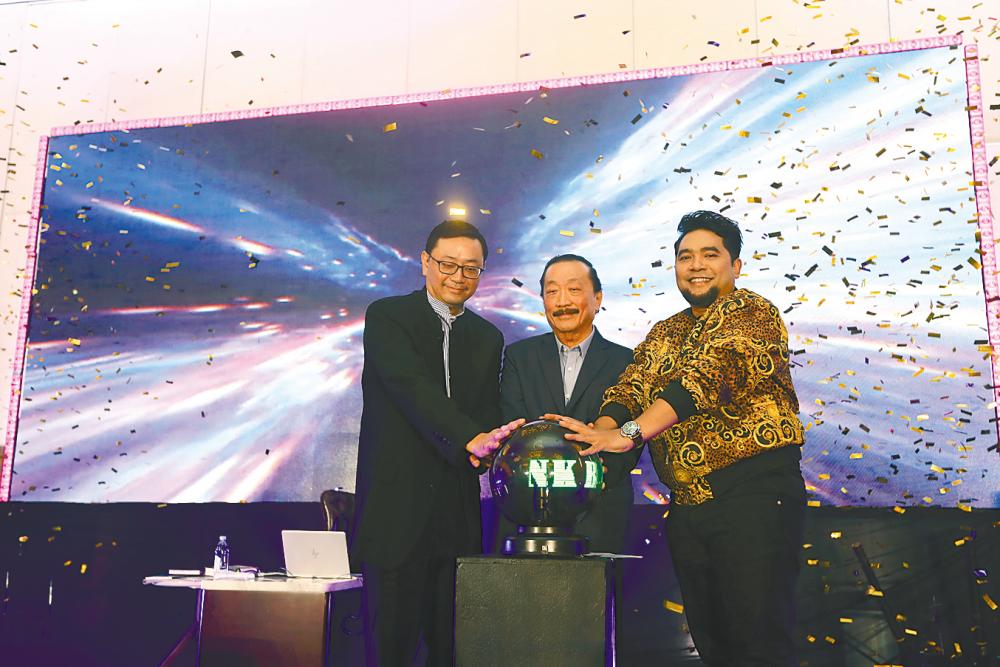 From left: BCorp CEO Datuk Sri Robin Tan, Vincent Tan and Nazri at the launch of the ICPG fund in conjunction with the seminar last Saturday. – NORMAN HIU/theSun