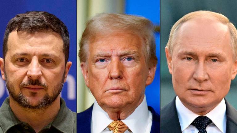 (FILES) (COMBO) This combination of file photographs created on August 8, 2025, shows (From L)-Ukrainian President Volodymyr Zelensky, US President-elect Donald Trump and Russian President Vladimir Putin - AFP PHOTO / Ukrainian Presidential Press Service