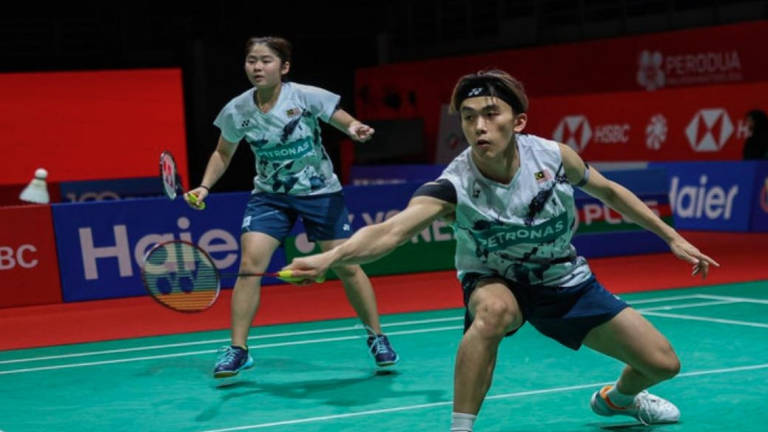 National mixed doubles players Cheng Su Yin and her partner Hoo Pang Ron. - BERNAMA